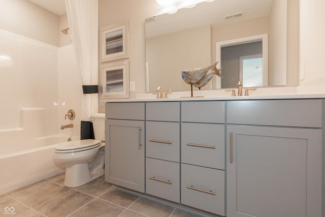 full bathroom with shower / tub combo, vanity, toilet, and tile patterned floors