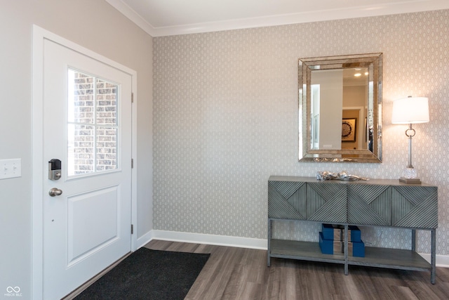 entryway featuring hardwood / wood-style flooring and ornamental molding