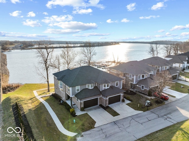 bird's eye view with a water view