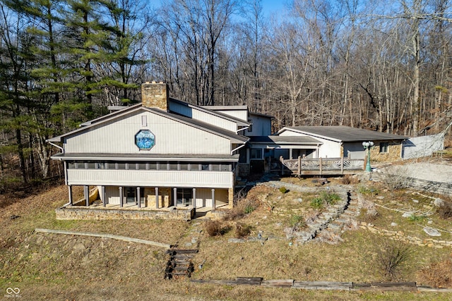 exterior space featuring a wooden deck