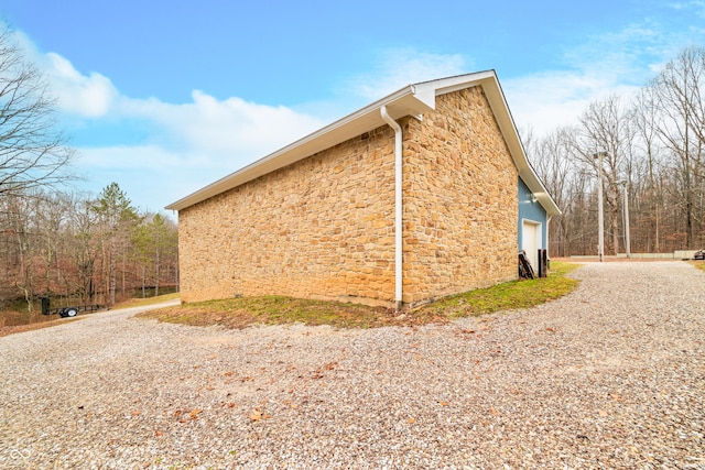 view of home's exterior featuring a garage