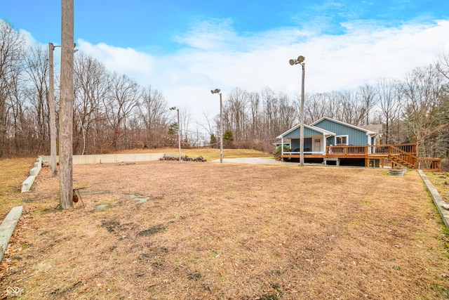 view of yard with a deck