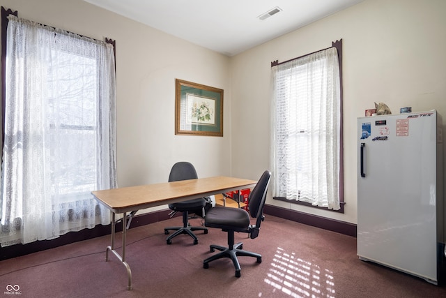 view of carpeted office space