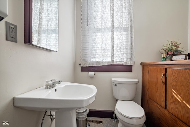 bathroom featuring toilet