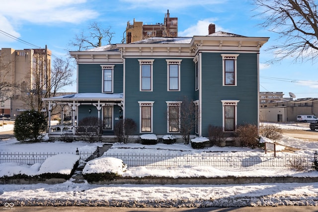 italianate-style house with covered porch