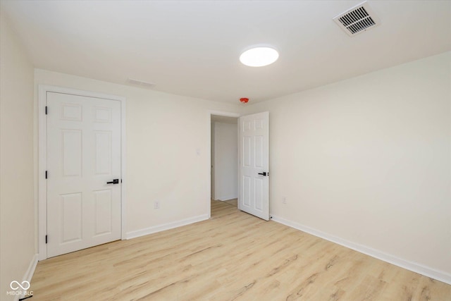 empty room featuring light wood-type flooring