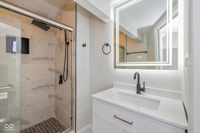 bathroom with vanity and an enclosed shower