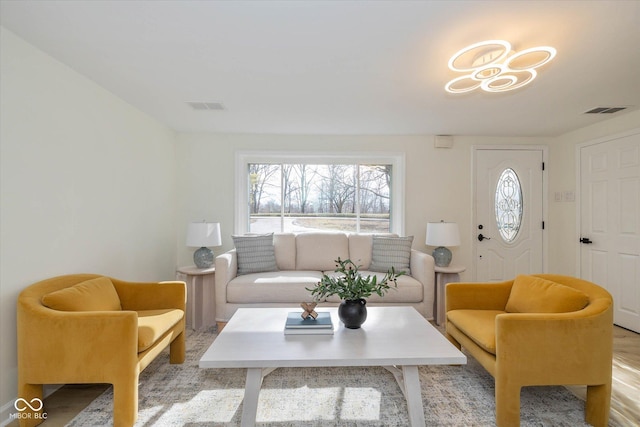 living room with light hardwood / wood-style floors