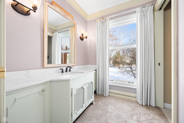 bathroom with vanity and ornamental molding