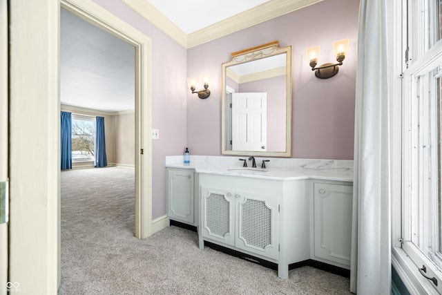 bathroom with vanity and ornamental molding