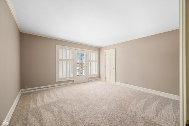 carpeted empty room featuring a baseboard radiator and crown molding