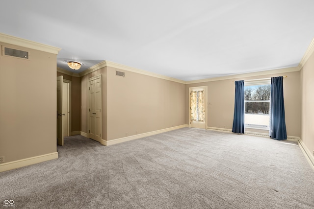 spare room with light carpet and ornamental molding