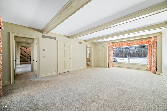 interior space with beam ceiling and crown molding