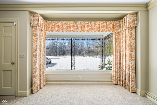 empty room with carpet flooring and baseboard heating