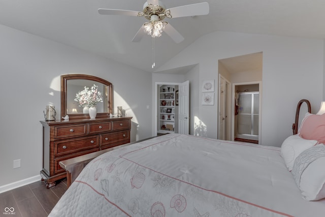 bedroom with ceiling fan, vaulted ceiling, a spacious closet, and a closet