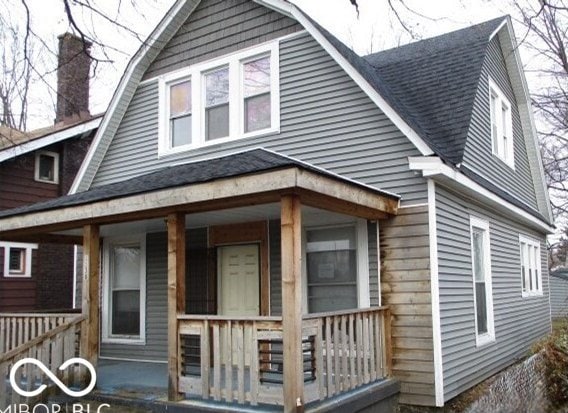 back of house with a porch