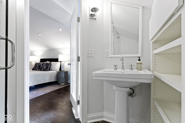 bathroom featuring wood-type flooring