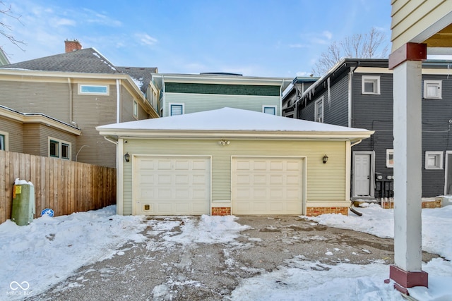 view of snow covered garage