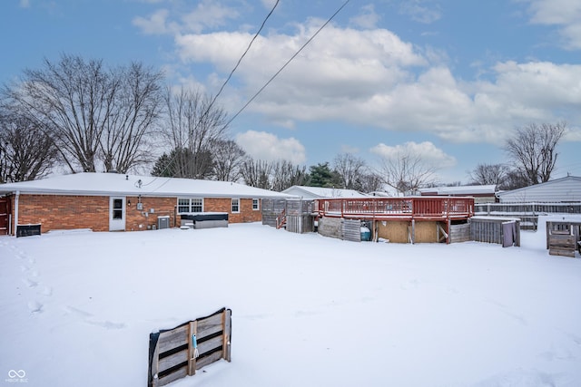 view of yard layered in snow