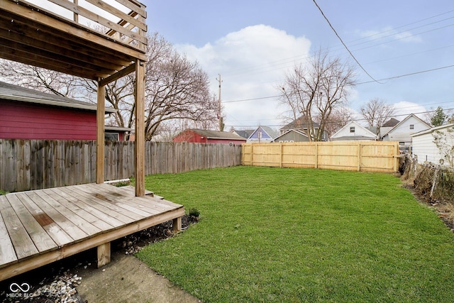 view of yard featuring a wooden deck