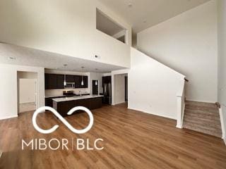 kitchen featuring a kitchen island and dark wood-type flooring