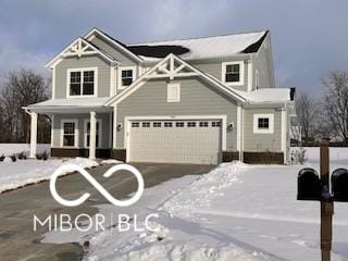 view of front of property with a garage