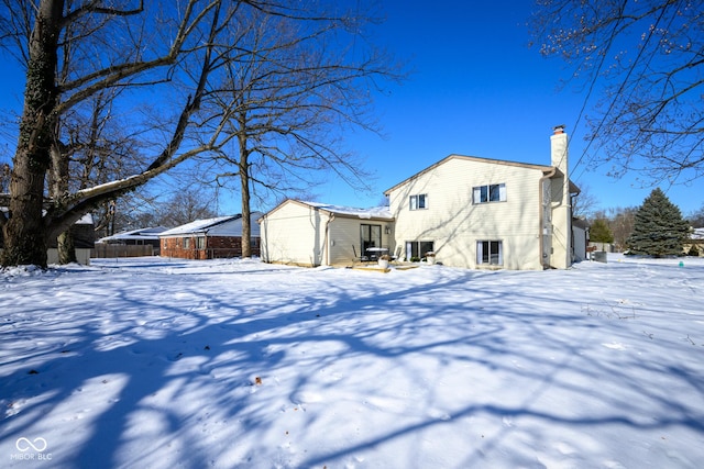 view of snow covered property