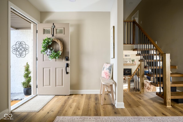 entryway with light hardwood / wood-style floors