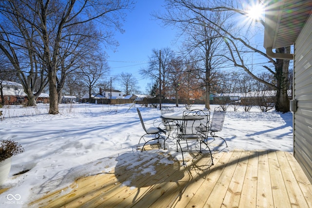 view of snow covered deck