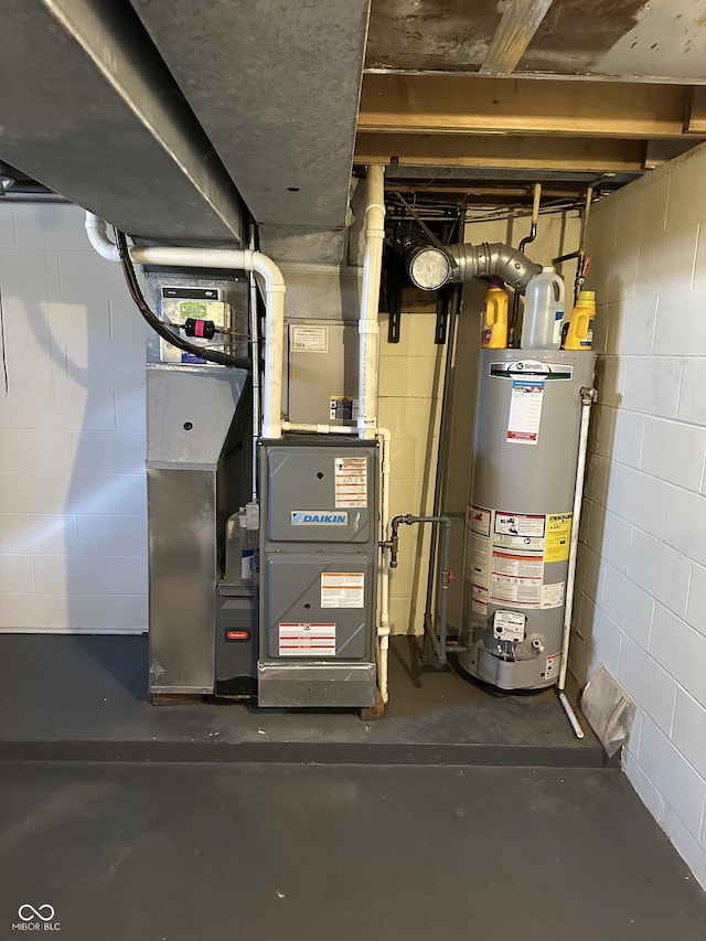 utility room featuring gas water heater and heating unit