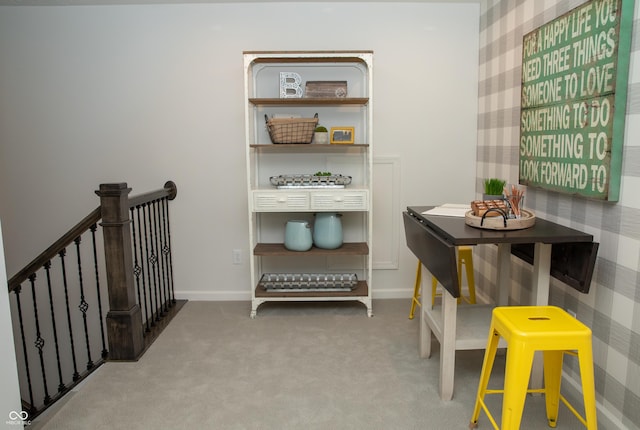 interior space featuring light colored carpet