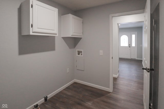 washroom with cabinets, washer hookup, and dark hardwood / wood-style floors