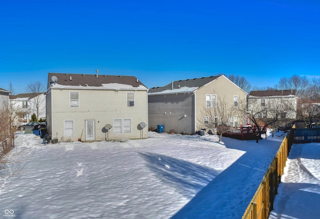 view of snow covered property