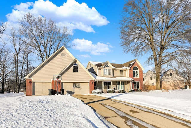 view of front of home with a porch and a garage