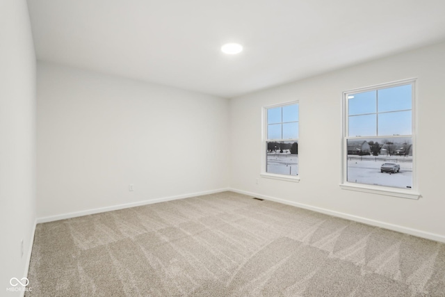 empty room featuring carpet