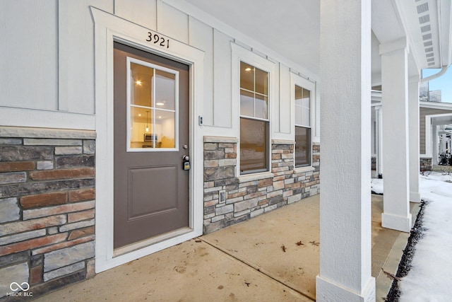 entrance to property with a porch