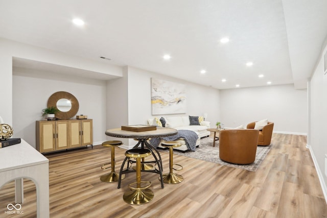 dining space featuring light hardwood / wood-style flooring