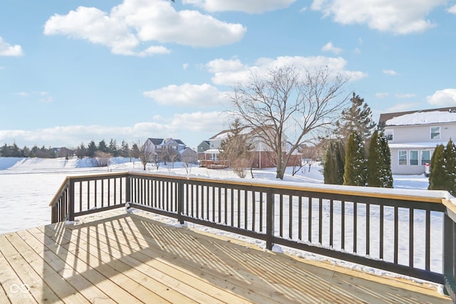 view of snow covered deck