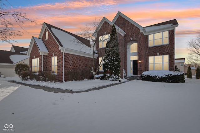 view of snow covered property