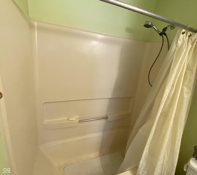 room details with a shower with curtain