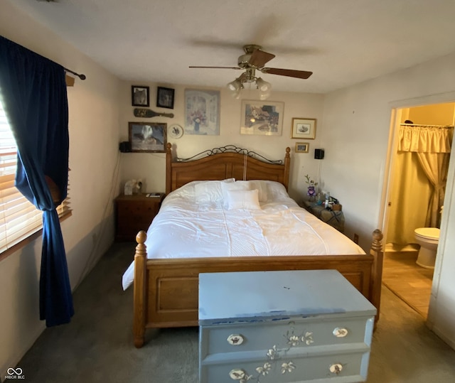 carpeted bedroom featuring ceiling fan and connected bathroom