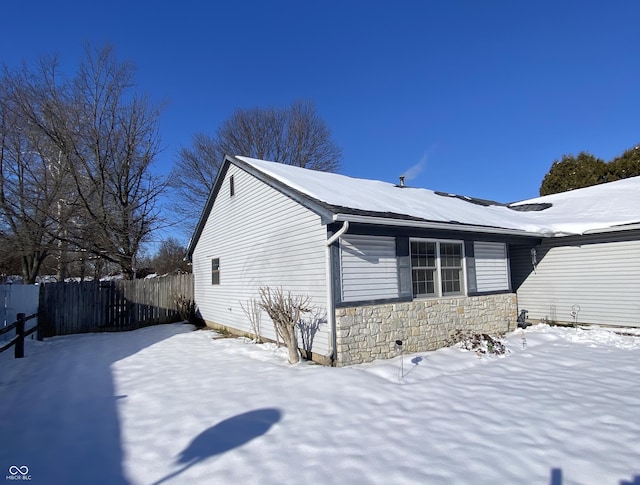 view of snow covered property