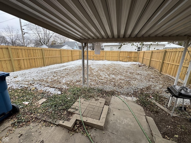 view of snow covered patio