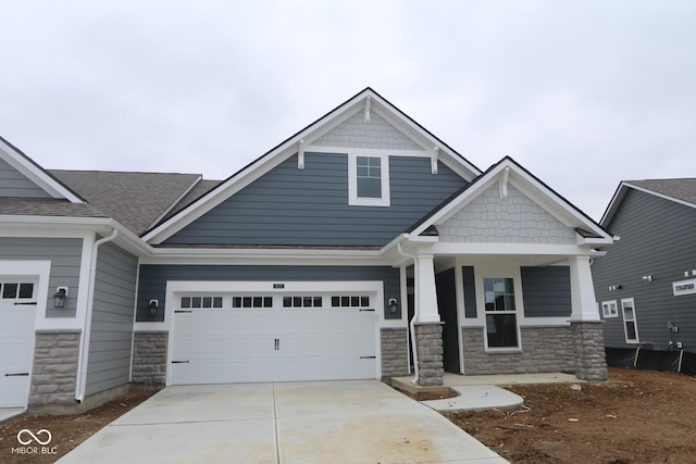 craftsman-style home featuring covered porch