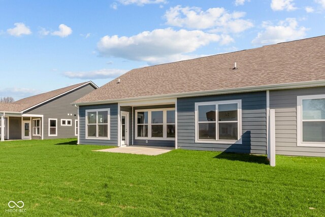 16673 Cattle Hollow Ln, Noblesville, IN 46060 - back of house with a yard and roof with shingles