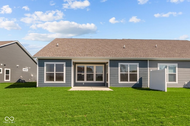 16673 Cattle Hollow Ln, Noblesville, IN 46060 - rear view of house featuring a lawn, a patio area, a shingled roof, and central AC