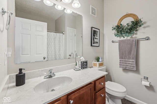 6595 Reserve Dr, Indianapolis, IN 46220 - full bathroom with vanity, toilet, and a shower with shower curtain