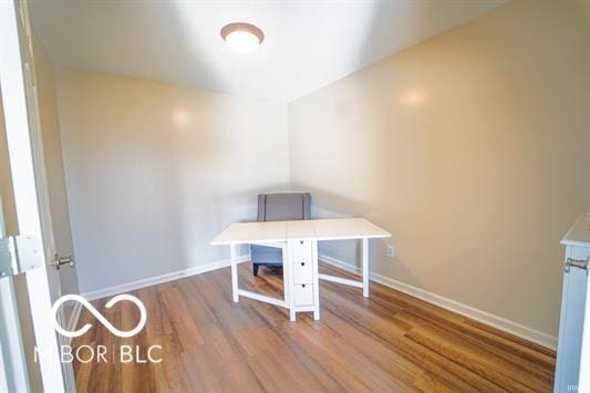 home office with light wood-type flooring