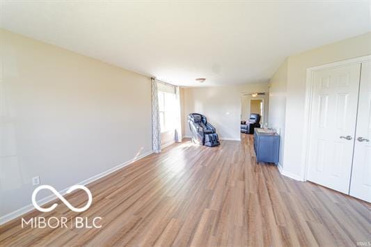 unfurnished room with light hardwood / wood-style flooring