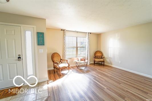 unfurnished room with light wood-type flooring